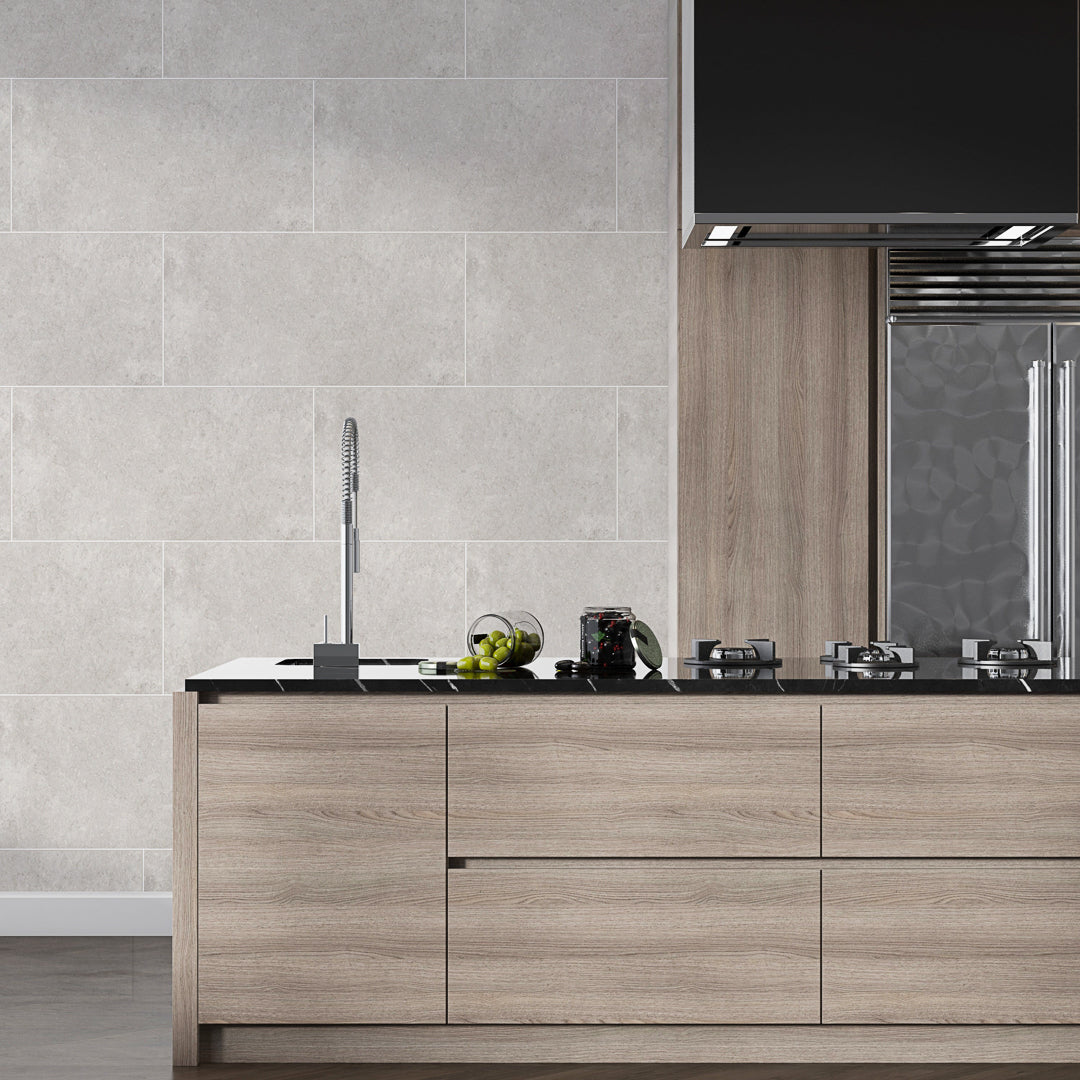 Apollo silver porcelain wall tiles with sleek glossy finish for modern and durable interiors.