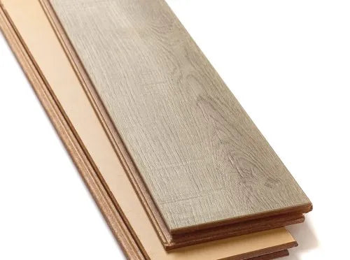 Durable AC5 laminate herringbone floor for high traffic areas with porcelain wall and floor tiles