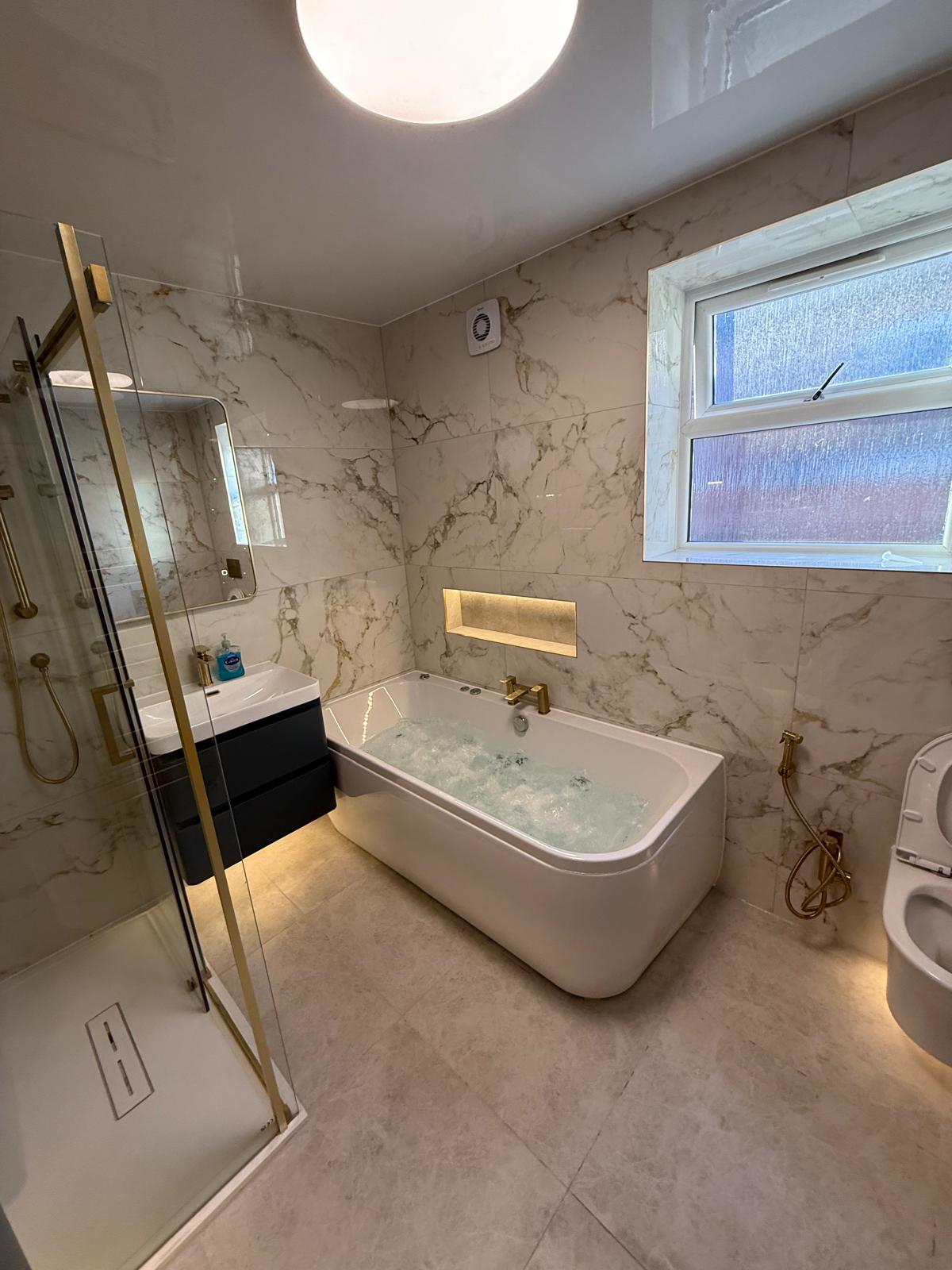 Gold marble effect porcelain wall and floor tiles for luxurious bathrooms and living spaces