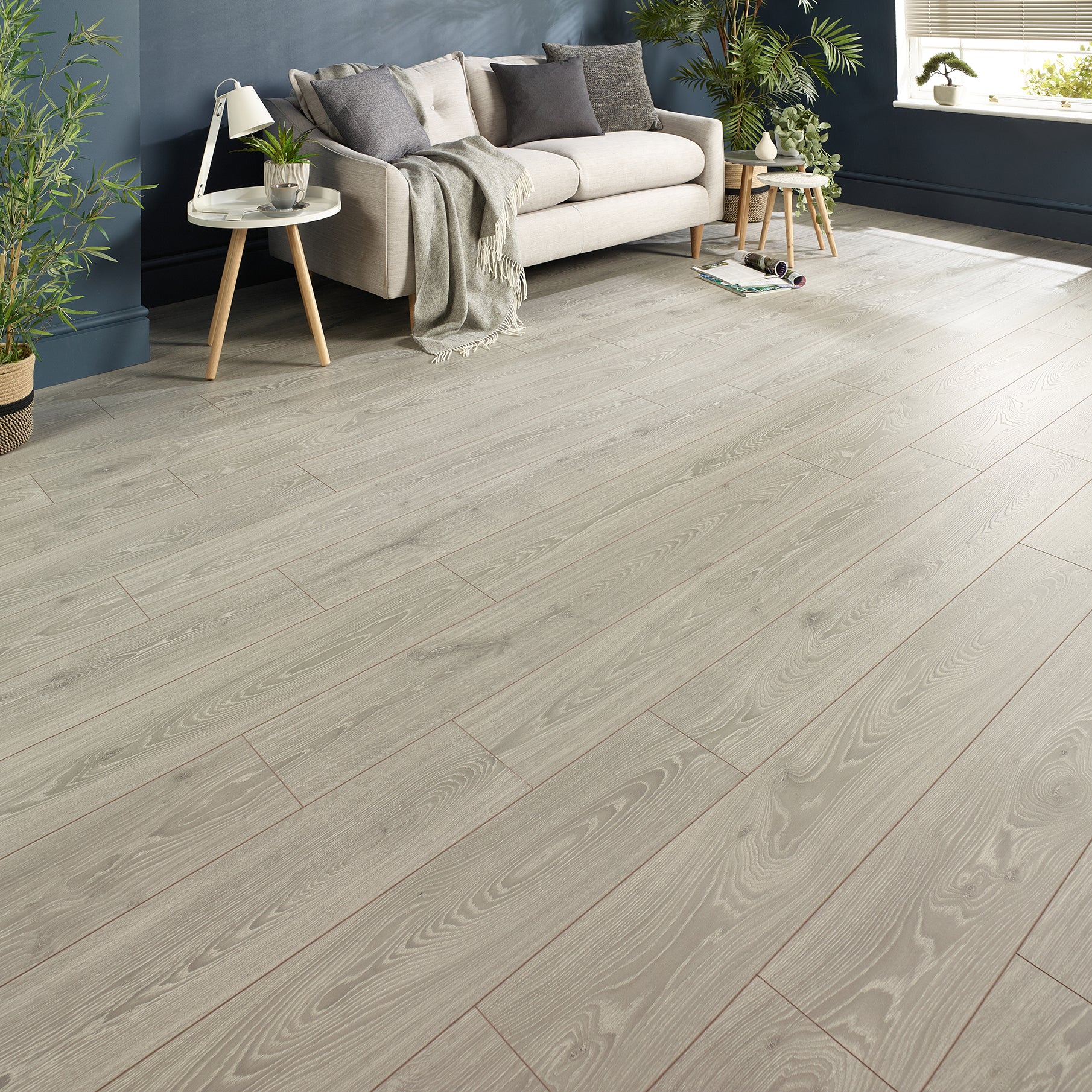 High Quality Laminate Flooring with Valencia oak effect, scratch-resistant design for modern interiors.