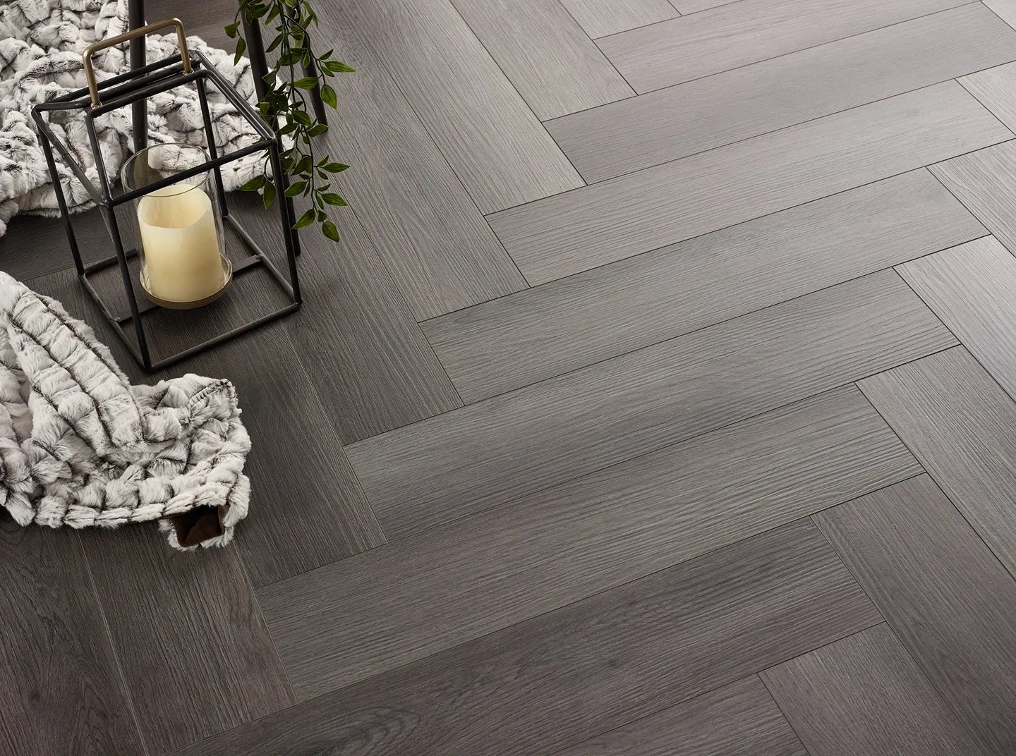 Hydro Loc luxury vinyl plank flooring in herringbone design with 5mm wear layer for durability