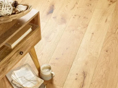 Natural brushed and lacquered country grade oak engineered wood flooring with rich grain patterns.