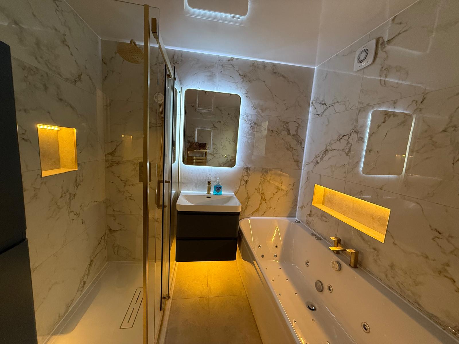 Premium porcelain wall and floor tiles with reflective marble finish for contemporary interiors