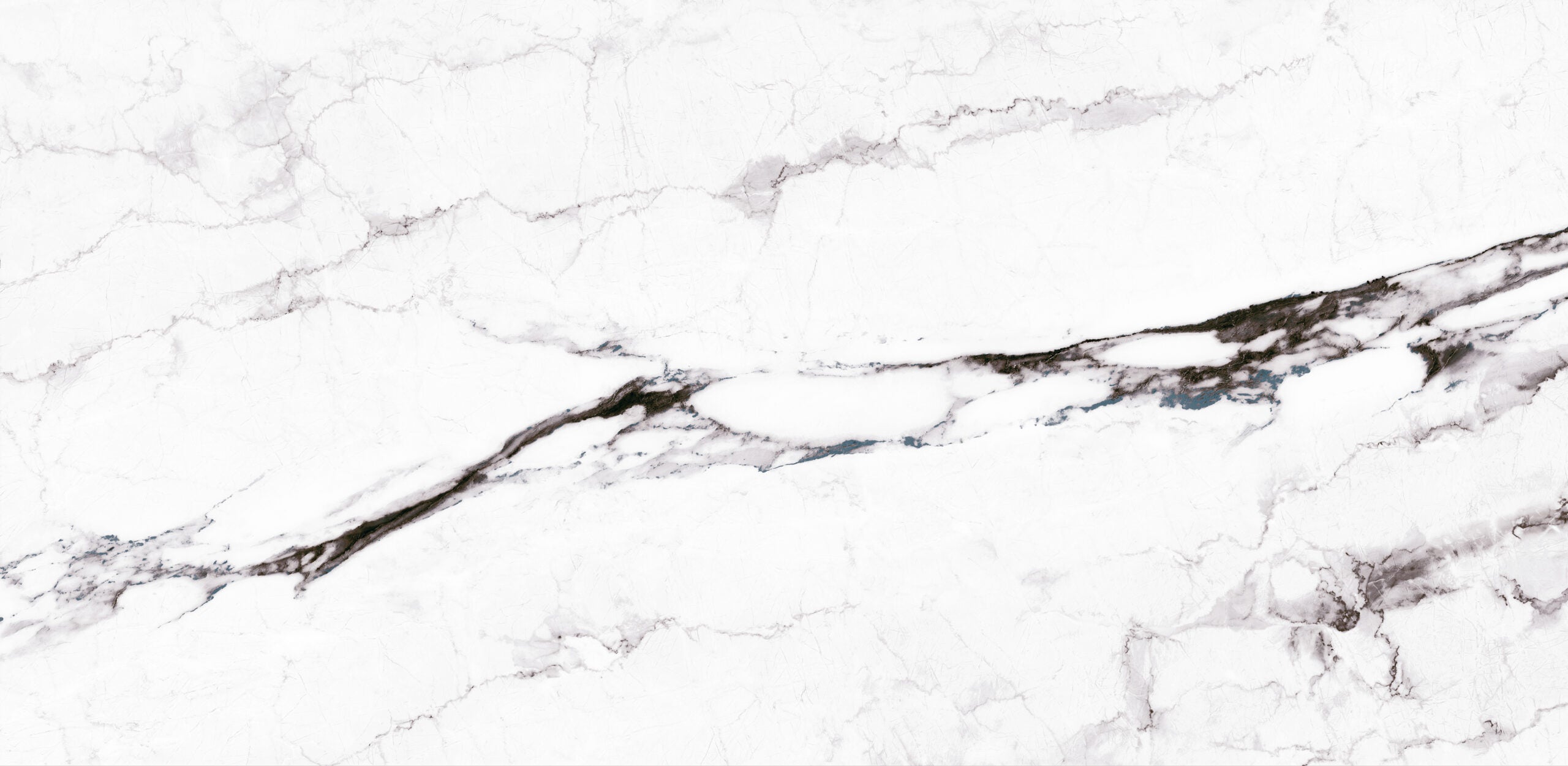 Rectified glossy porcelain wall and floor tiles in white creating a spacious and luxurious appearance.