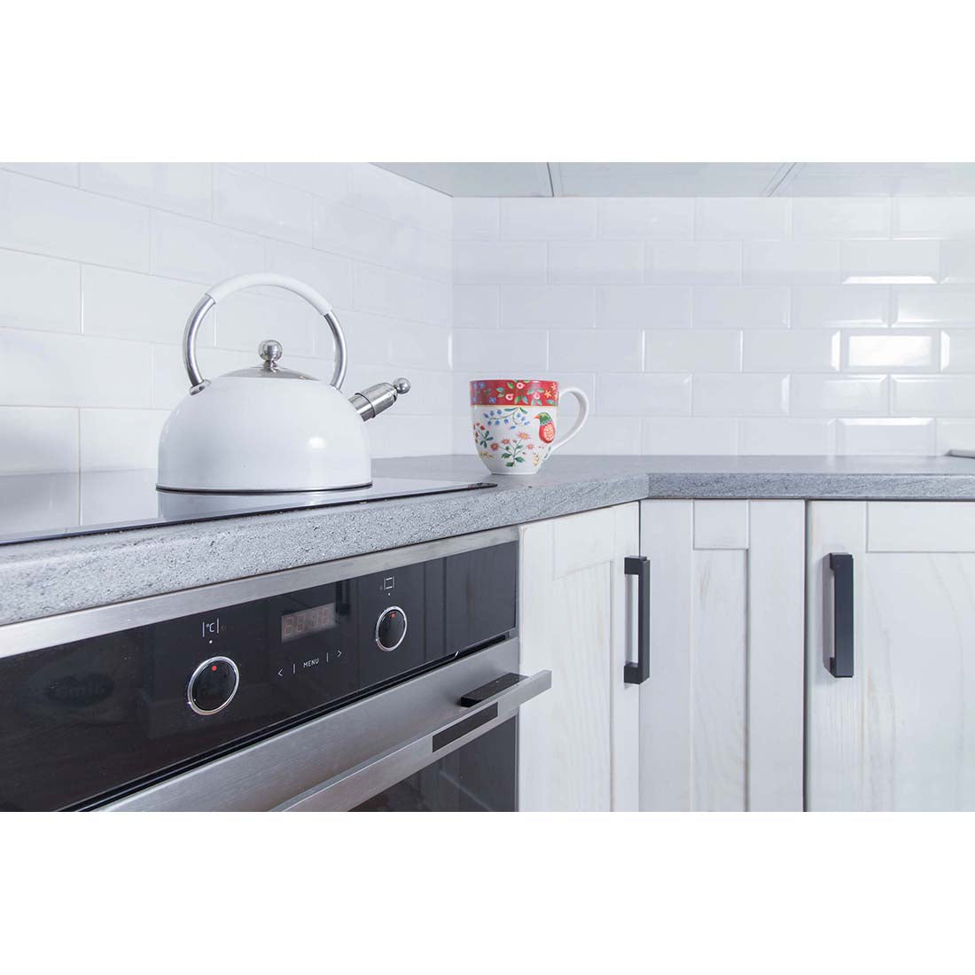 White gloss bevelled porcelain wall and floor tiles with sleek ceramic finish