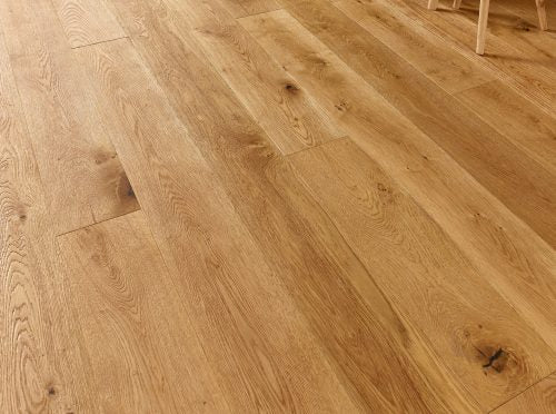 Wide plank American white oak flooring with hand-scraped texture and engineered wood panel durability