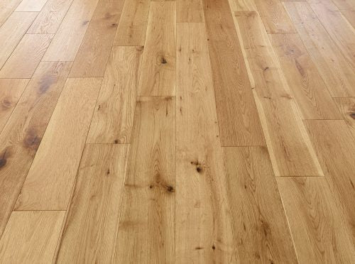 Wide plank engineered wood flooring with brushed texture and 3mm oak veneer.