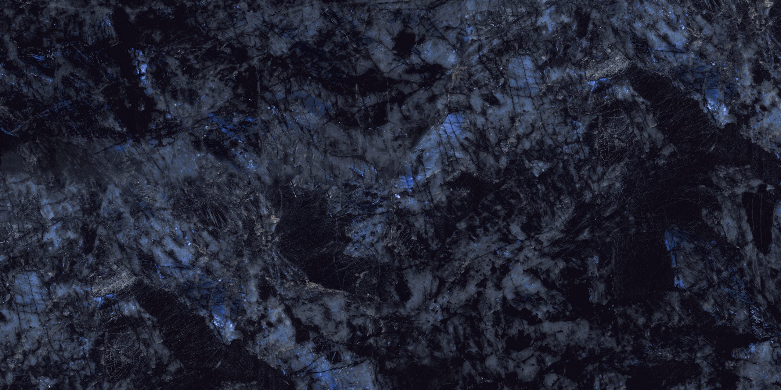 Dark blue glossy porcelain wall and floor tiles with seamless finish for contemporary spaces.