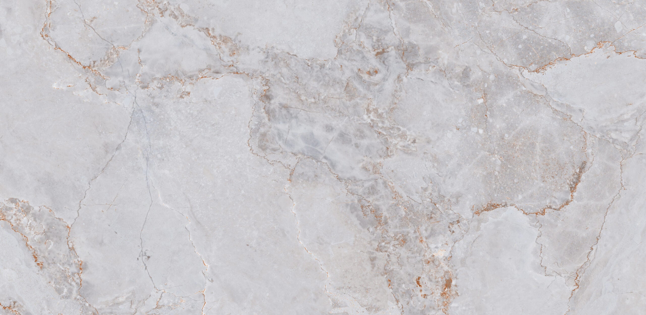Glossy white marble effect porcelain wall and floor tiles creating a bright and luxurious finish.