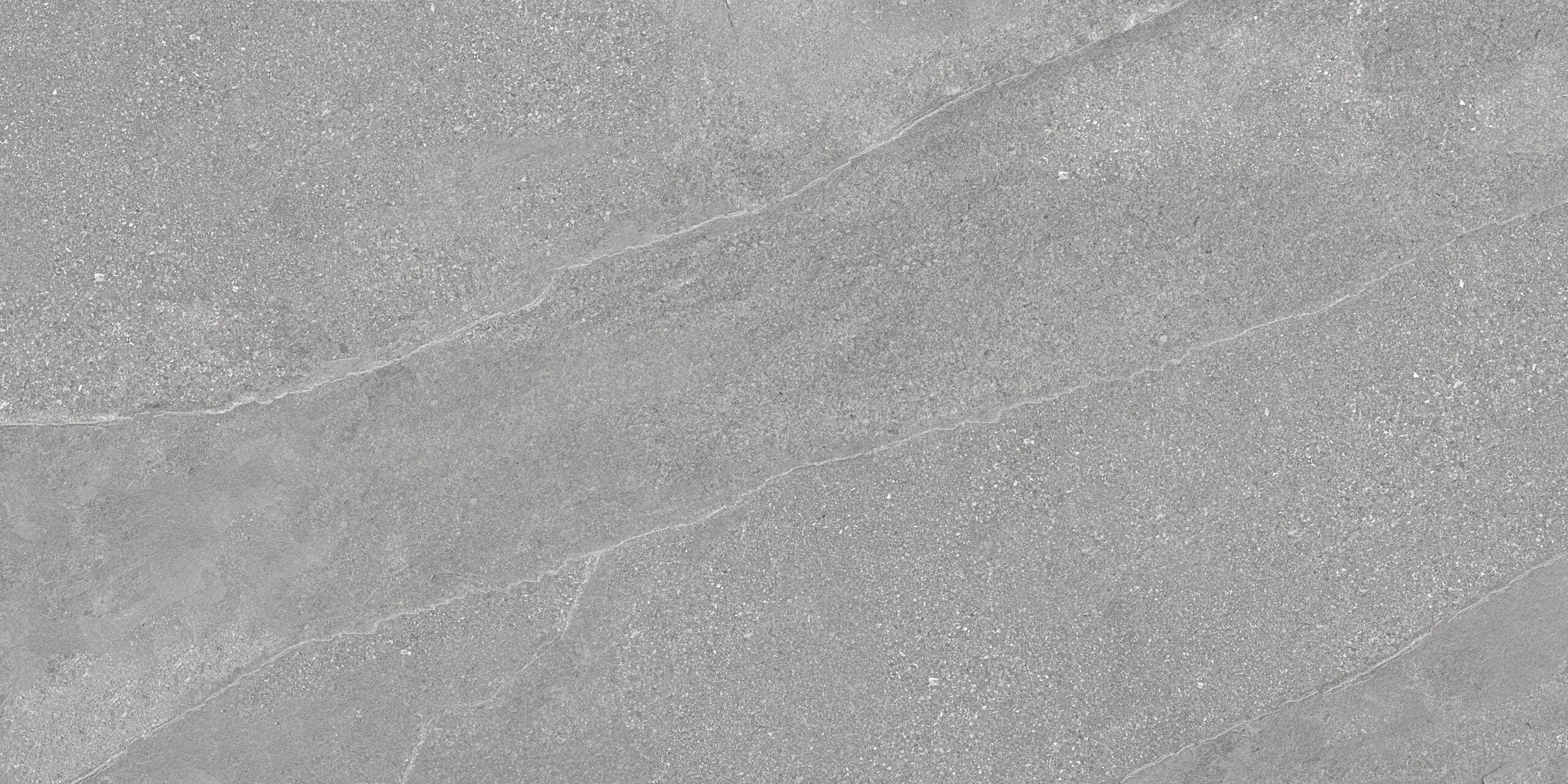 Grey stone effect porcelain wall and floor tiles with matte geometric finish for interiors.