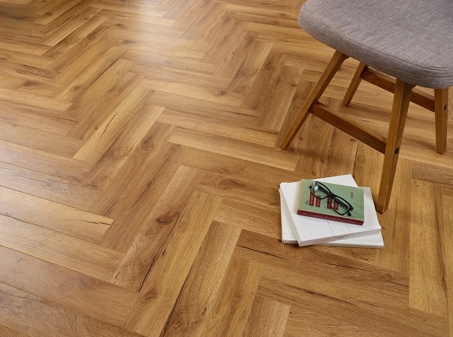 Helsinki herringbone waterproof laminate flooring with wood effect and porcelain wall and floor tiles