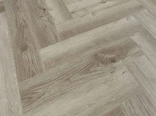 Herringbone vinyl flooring planks with 0.3mm embossed wear layer for durability in high-traffic areas