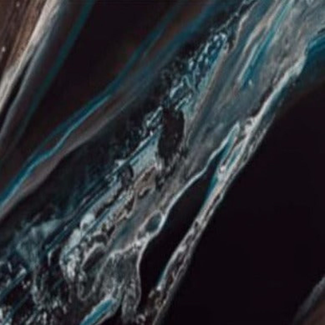 Large format Parastico Turquoise Porcelain Wall And Floor Tiles with fluid wave-like patterns.