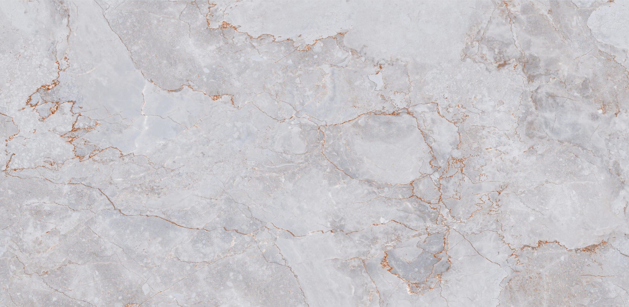 Large format porcelain wall and floor tiles with white geometric marble design for feature walls.