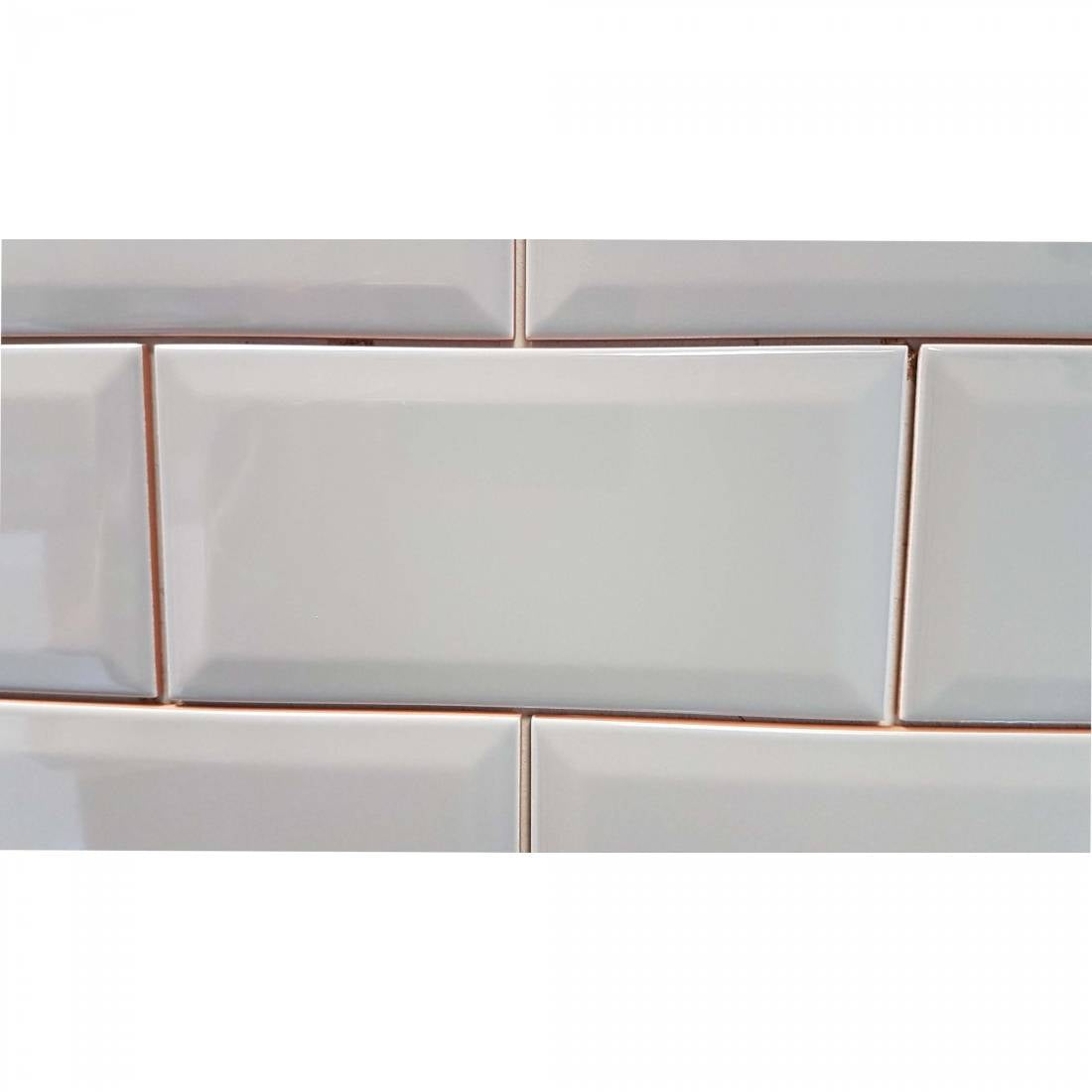 Modern grey porcelain wall and floor tiles with reflective bevelled surface
