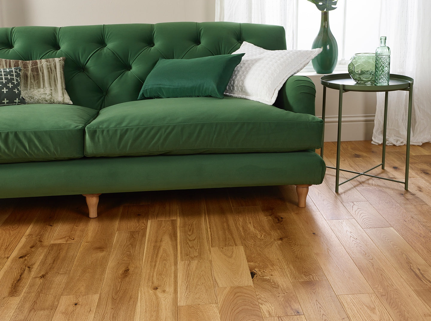 Natural brushed and lacquered engineered wood flooring with warm oak grain finish.