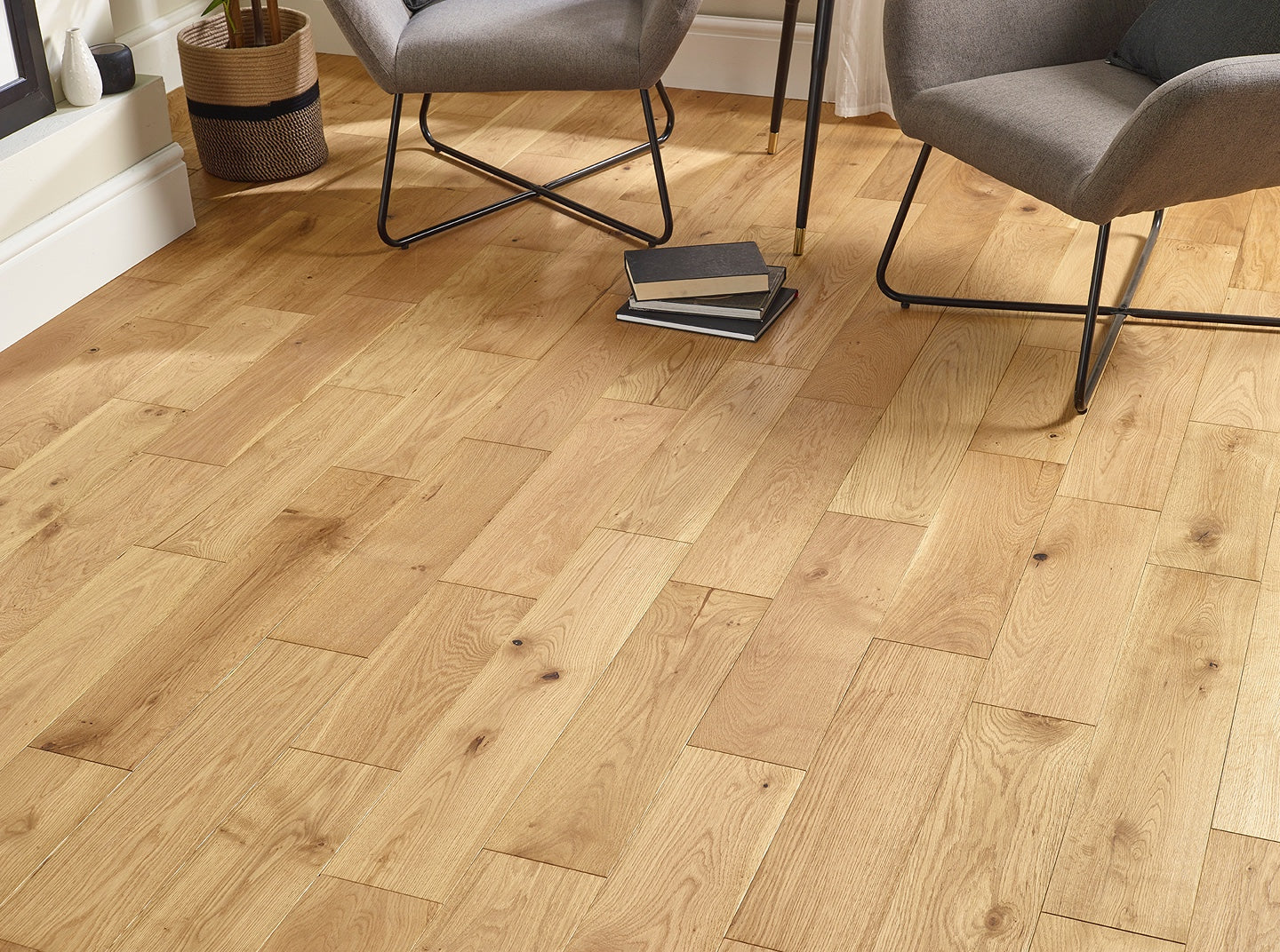 Natural brushed and oiled oak engineered wood flooring with textured wide planks for warm modern interiors.