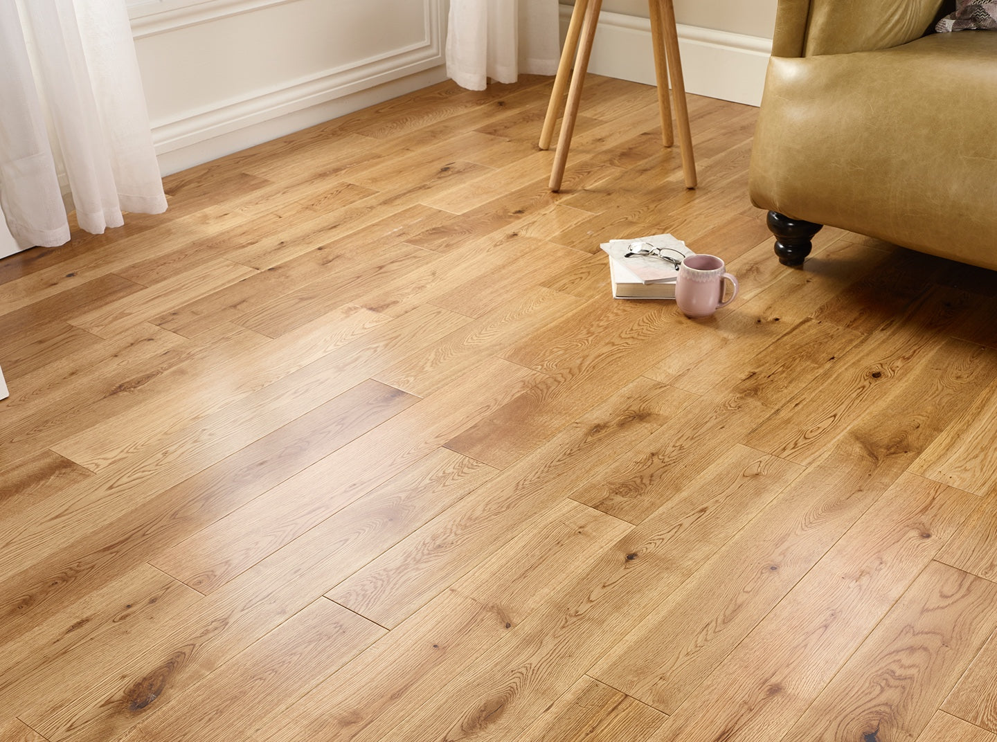 Natural lacquered engineered wood flooring with subtle sheen and durable oak veneer.