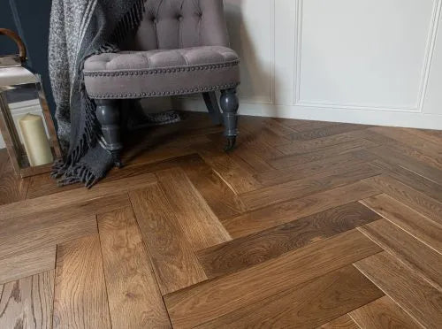 Durable oak engineered wood flooring with 5mm wear layer and lacquered finish for interiors.