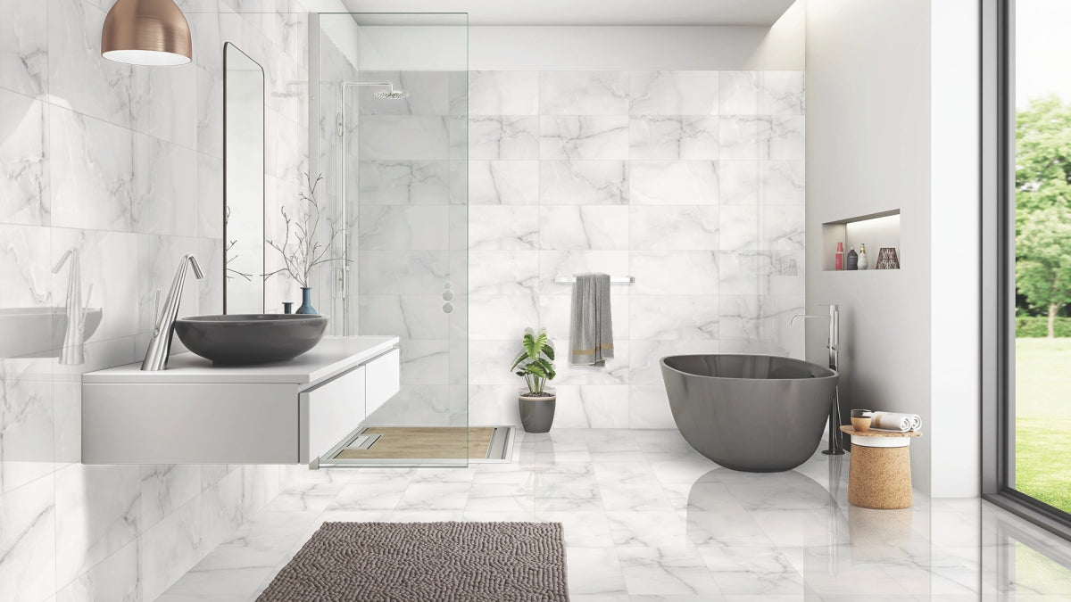 Onyx Ice Silver polished marble effect Porcelain Wall And Floor Tiles with frosted grey veining.