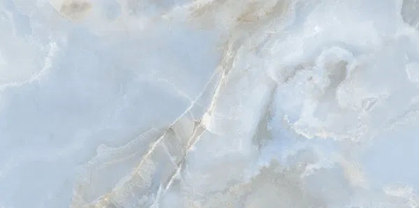Polished Oni Pearl Porcelain Wall And Floor Tiles featuring muted blue and pearl shades for elegant spaces.