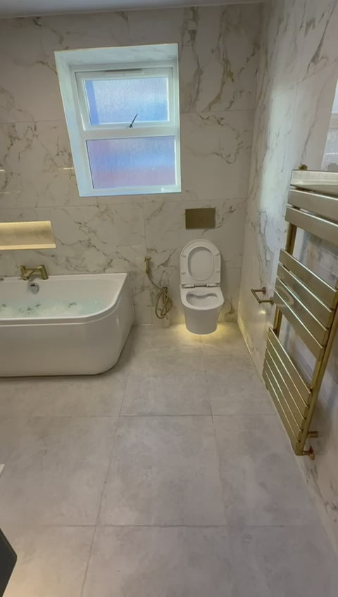 Marble look porcelain wall and floor tiles with glossy finish for sophisticated interiors