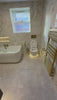 Marble look porcelain wall and floor tiles with glossy finish for sophisticated interiors
