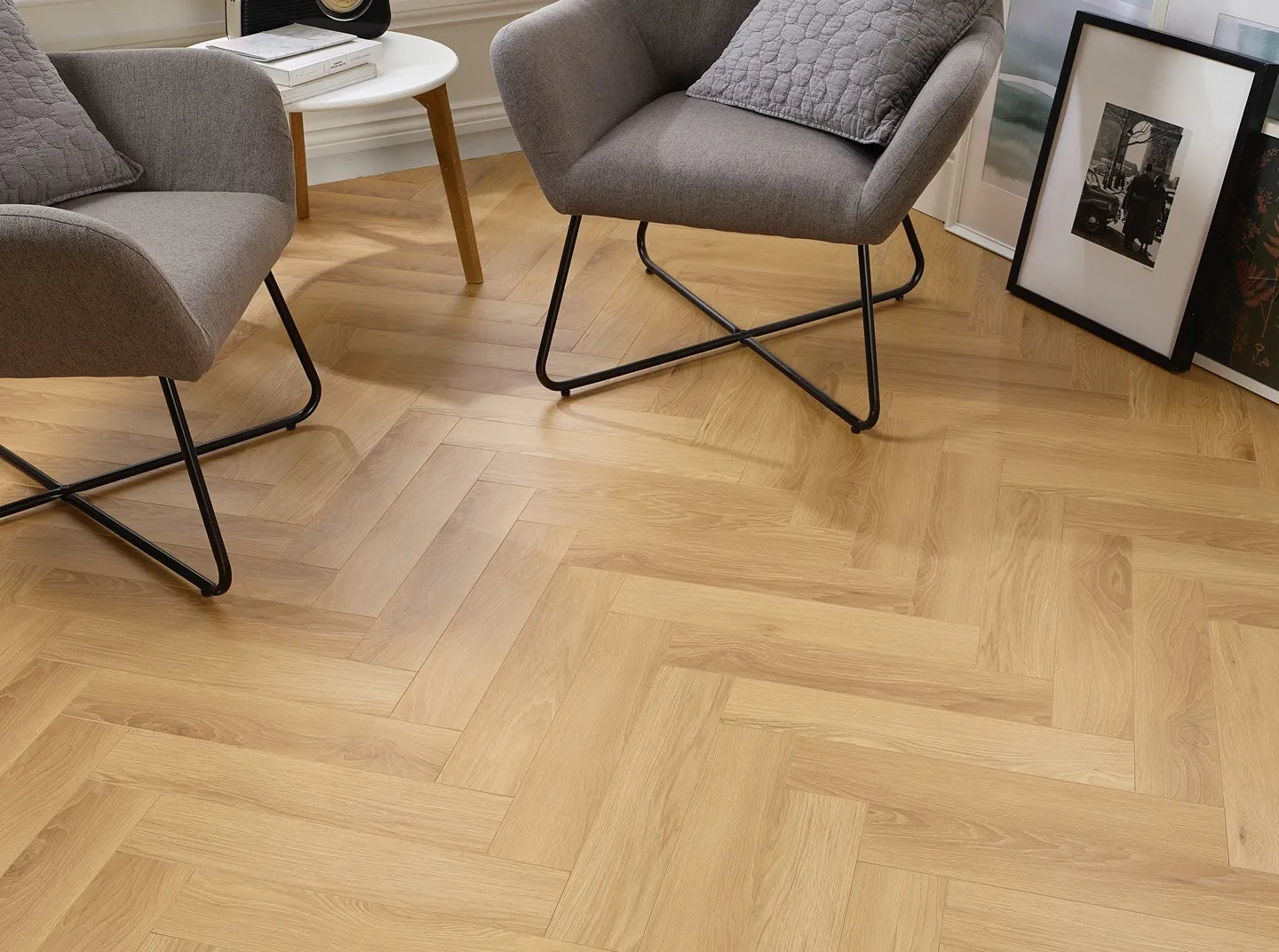 Stockholm herringbone laminate flooring with parquet design and porcelain wall and floor tiles