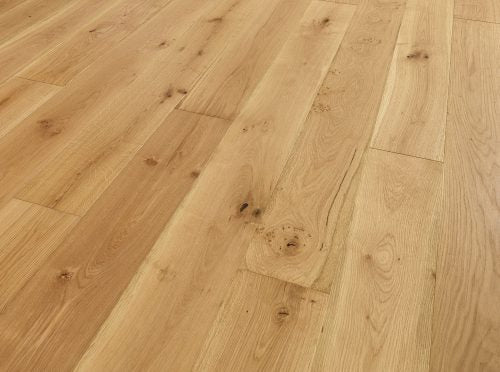 Wide 190mm oak engineered wood flooring with brushed texture and natural golden tones for elegant interiors