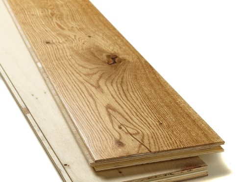 Wide plank natural oak engineered wood flooring with tongue and groove system for durable home flooring.