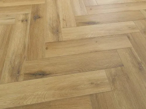Wood-effect vinyl LVT flooring in herringbone pattern, 100% waterproof and durable for busy households.